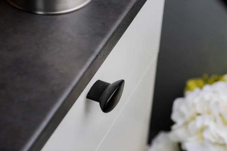 4 boutons de meuble ovales, zamak noir verni L.40 mm